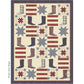 Close up image of an Americana inspired lap quilt pattern with blue and red boots, stars and stripes on a beige background.