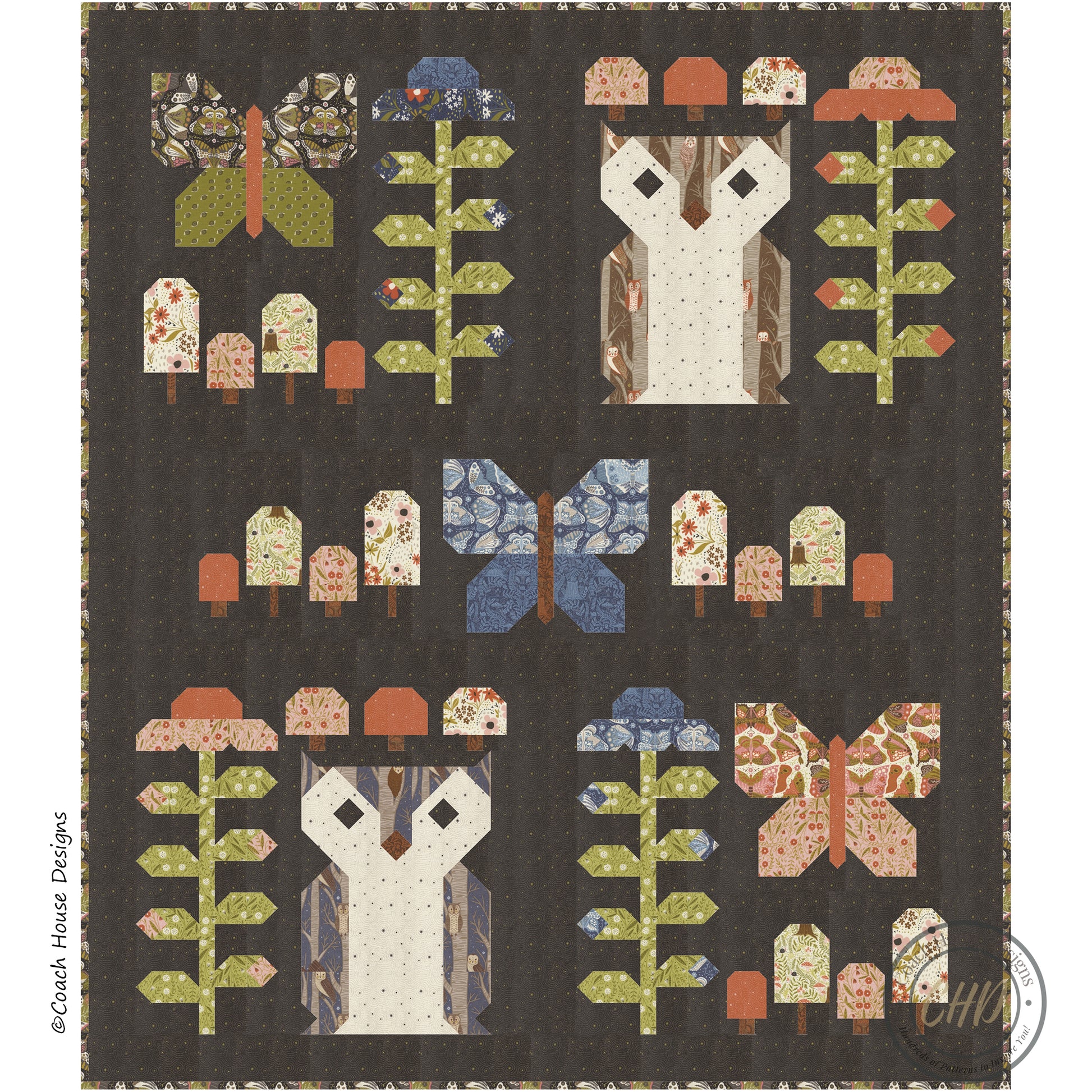 Lap Quilt with owl blocks, flower blocks, mushroom blocks and butterfly butterfly blocks on a dark background
