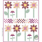 Lap quilt pattern with floral designs and checkered patterns on a white background